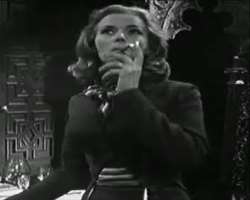 Honor Blackman smoking